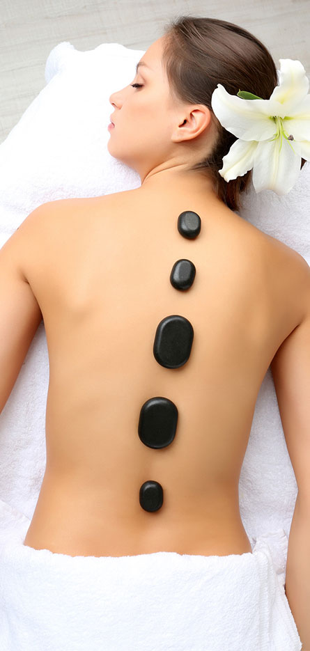 services_massage Lady getting a stone massage
